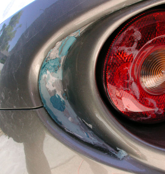 Lotus Elise taillight grille removal, putty