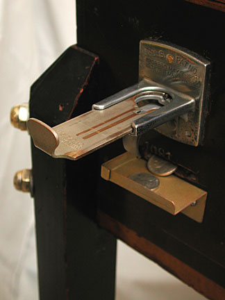 coin slide and token return tray